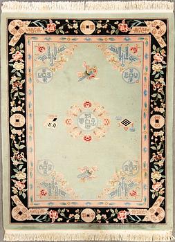 A Chinese carpet ca 230x 166 cm.