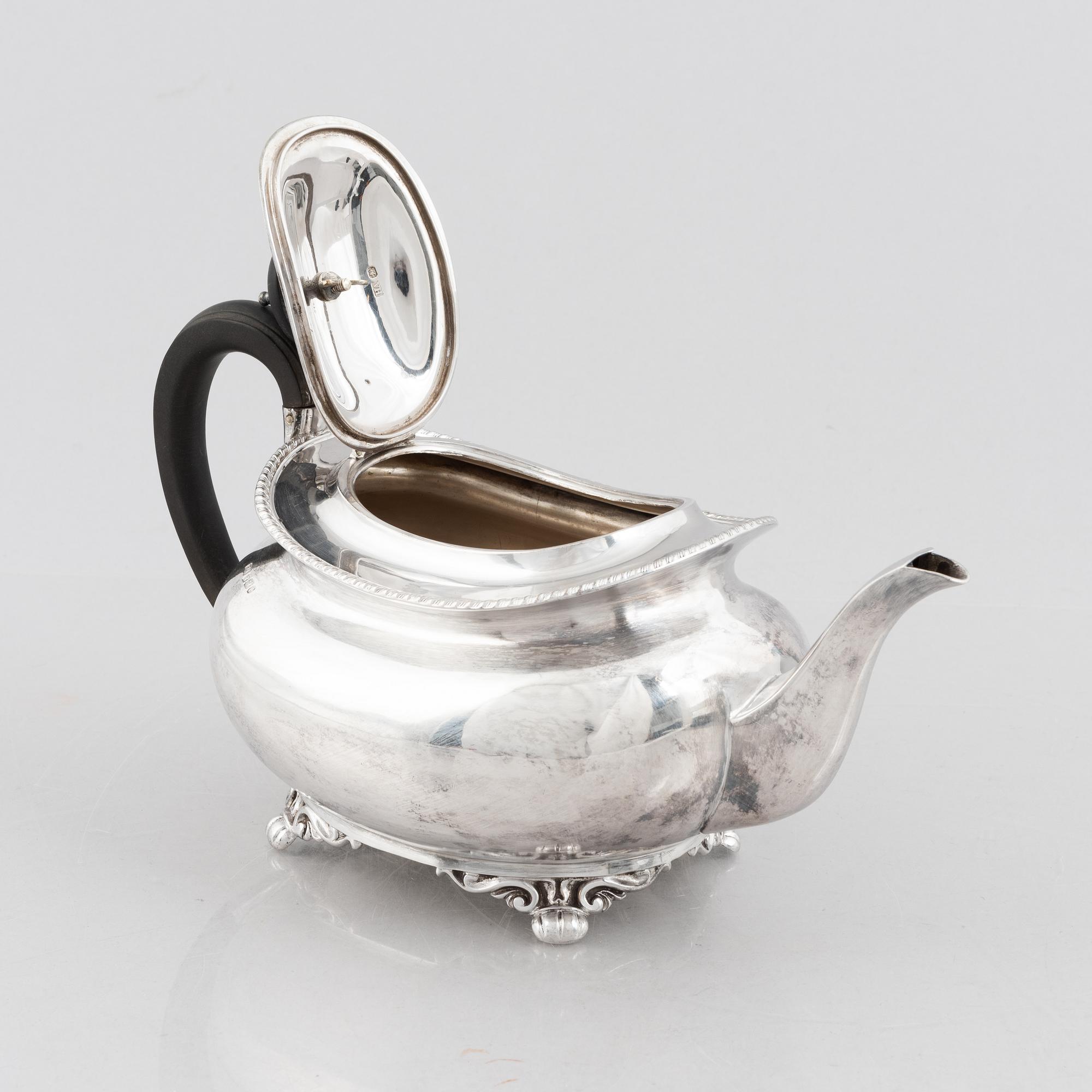 An English silver teapot, mark of Atkin Brothers, Sheffield 1895.