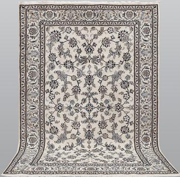 A part silk Nain carpet, ca 305 x 198 cm.