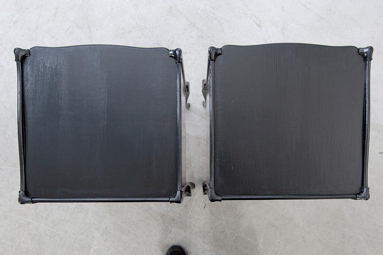 A pair of Rococo-style bedside tables later part of the 20th century.