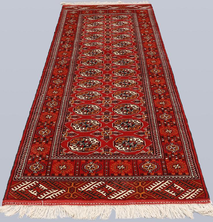 A runner,Turkmenistan, approx. 295 x 90 cm.
