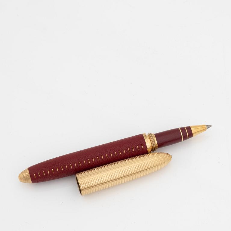 Louis Vuitton, a red leather and gold plated 'Doc Cuir' rollerball pen.