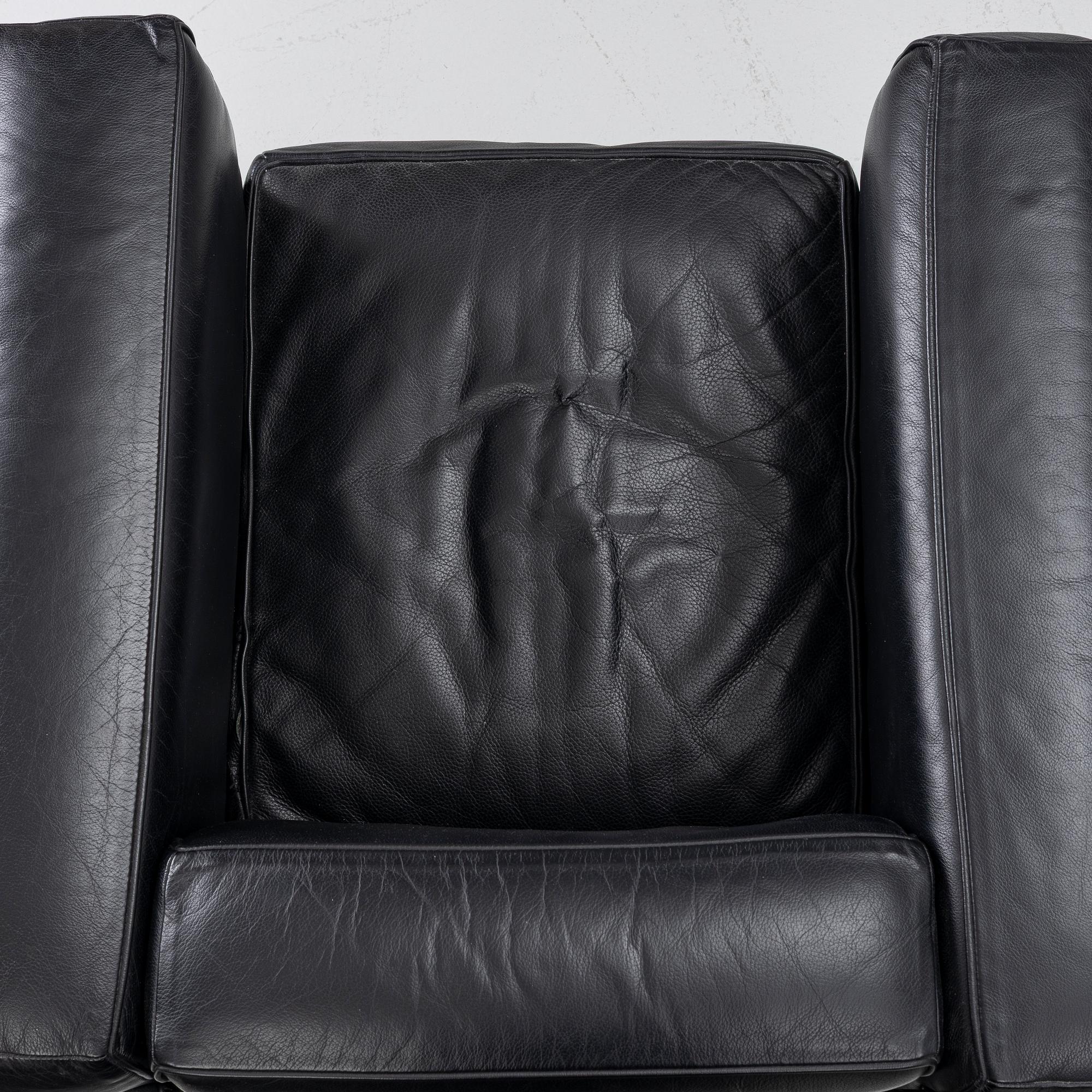 Le Corbusier (Charles-Édouard Jeanneret), Pierre Jeanneret, Charlotte Perriand & Le Corbusier, a pair of 'LC2' armchairs, Cassina.