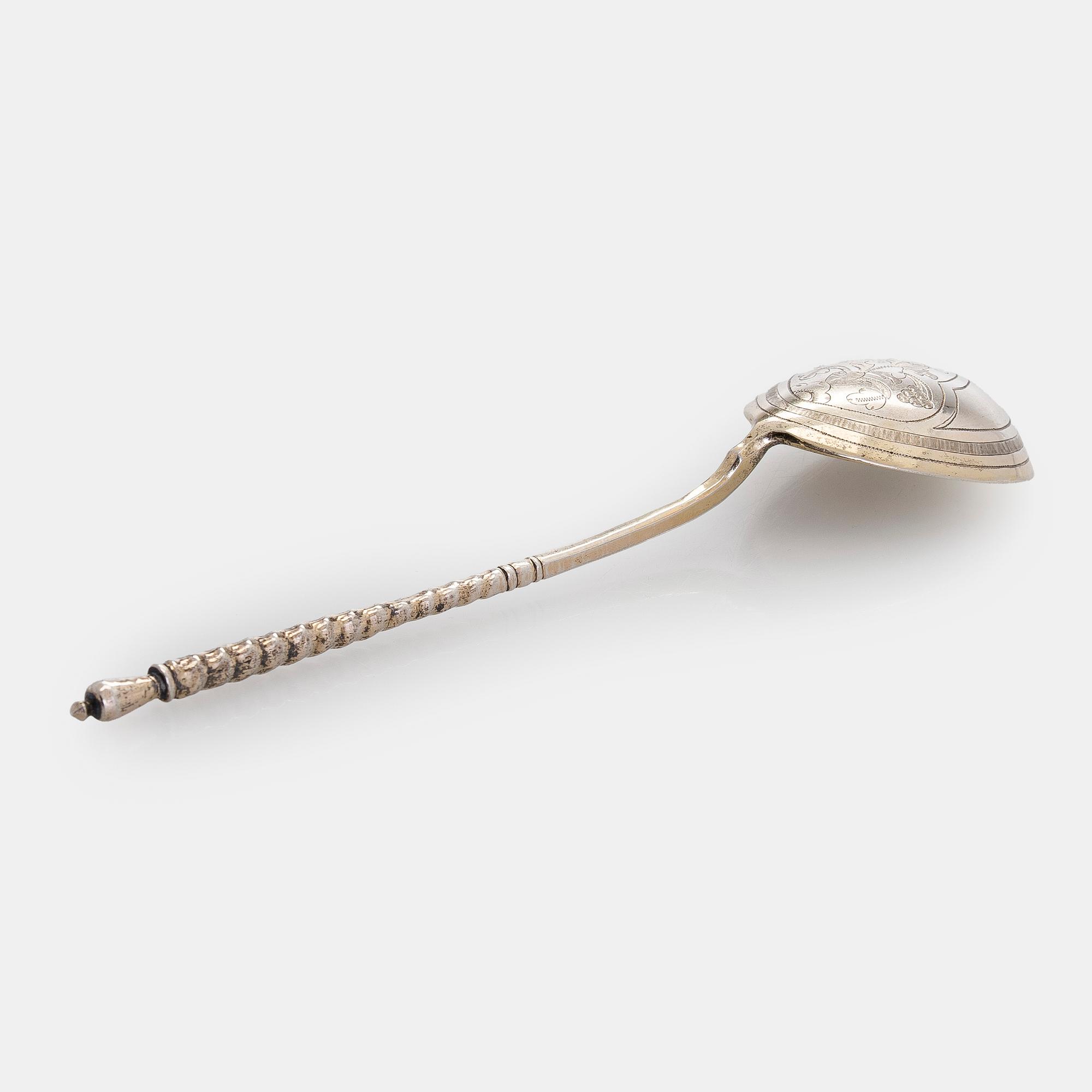A parcel-gilt silver jam spoon, Moscow 1881.
