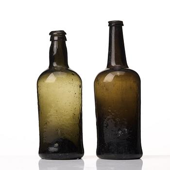 Two green glass bottles, 18th/19th Century.