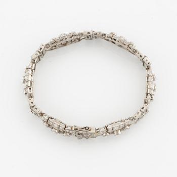 A platinum bracelet with round brilliant-and eight-cut diamonds.