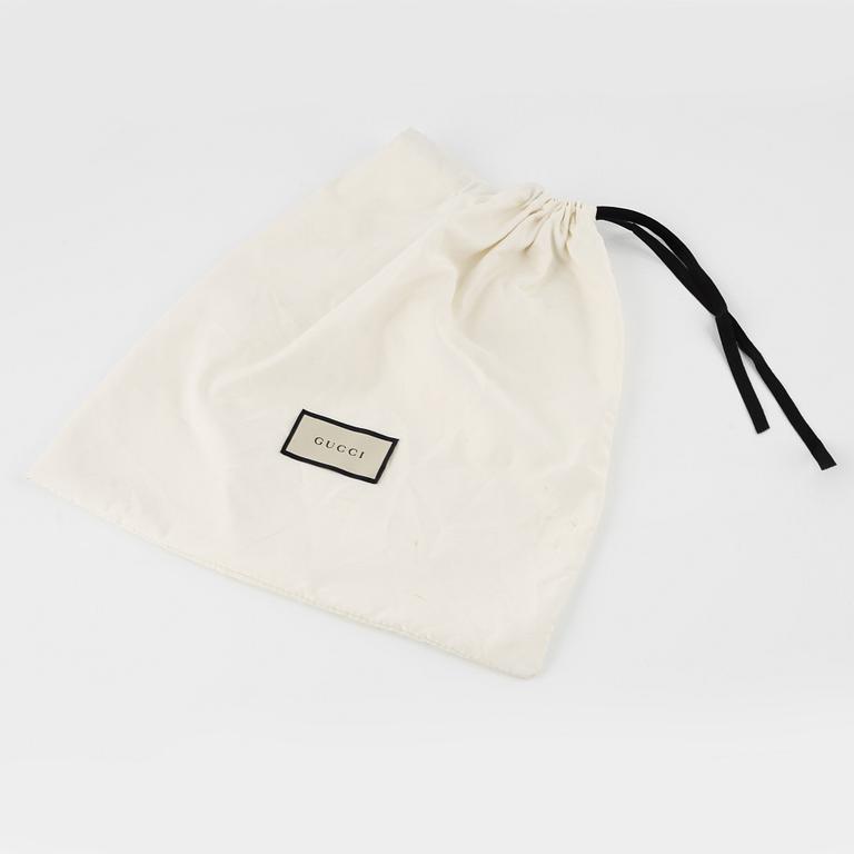 Gucci, a  'Matelassé Python GG Marmont'Shoulder Bag.