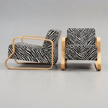 A pair of Alvar Aalto 'Padded Paimio' easy chairs, Artek, Finland.