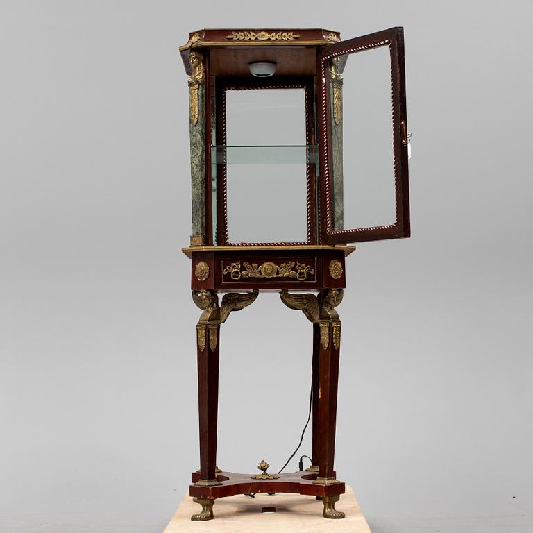 An Empire style cabinet, mid 20th Century.
