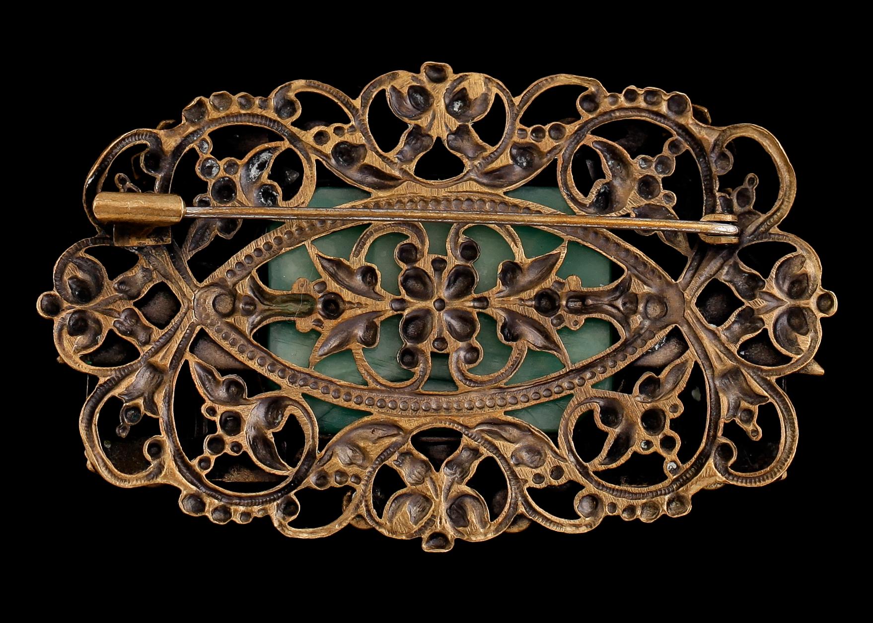 BROSCH, mässing, 1900-talets första hälft.