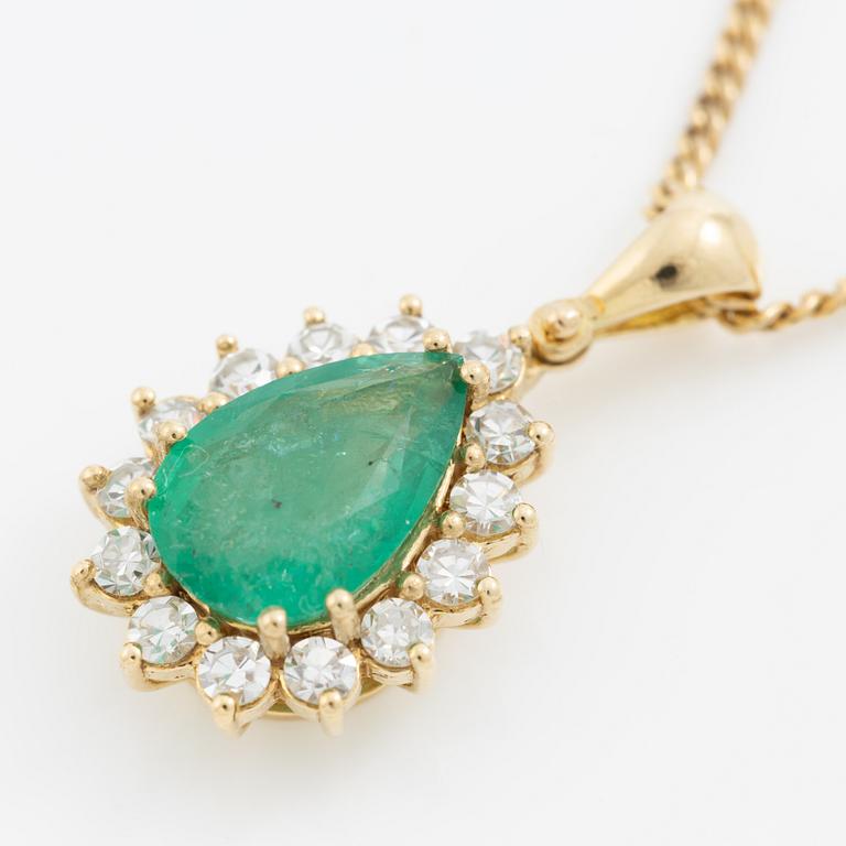 Gold necklace with a drop-shaped emerald and octagon-cut diamonds.