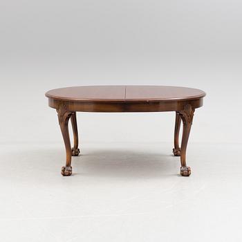 A late 20th century 10 piece Chippendale dining group.