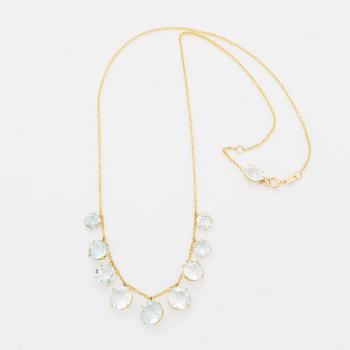 Collier, med runda fasettslipade akvamariner.