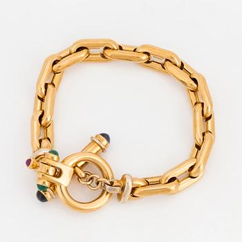 BRACELET, 18K gold, an anchor-link with cabochon rubies, sapphires and emeralds.