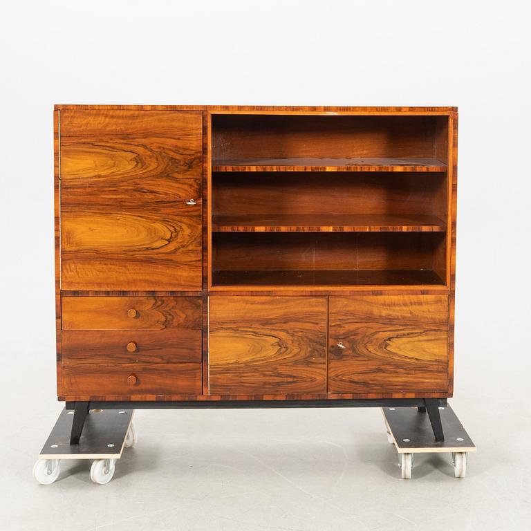 Display cabinet, 1940s.