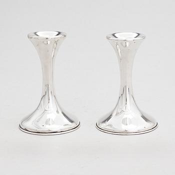 A pair of silver candlesticks, latter half of the20th century.