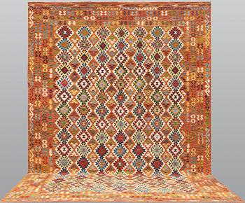 A Kilim carpet, c. 497 x 305 cm.