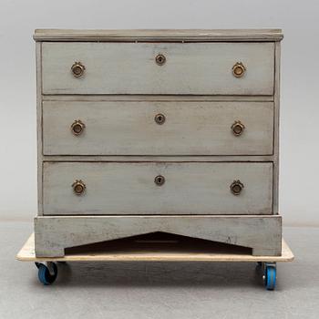 A mid 19th century painted chest of drawers.