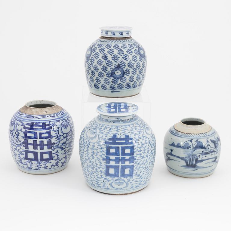 A group of four Chinese blue and white jars, late 19th Century/early 20th Century.