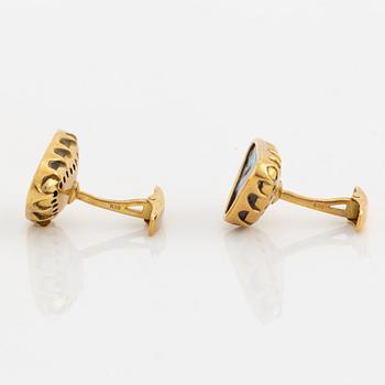 18K gold and possilbly opal imitation cufflinks.