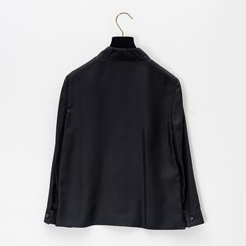 Prada, a black silk blouse, size 36.