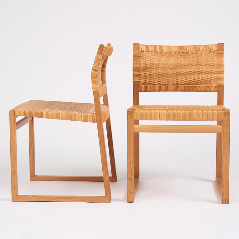 Børge Mogensen, a set of six oak and rattan 'BM61' chairs and a pair of BM62, Fredericia, Denmark, 1950s.