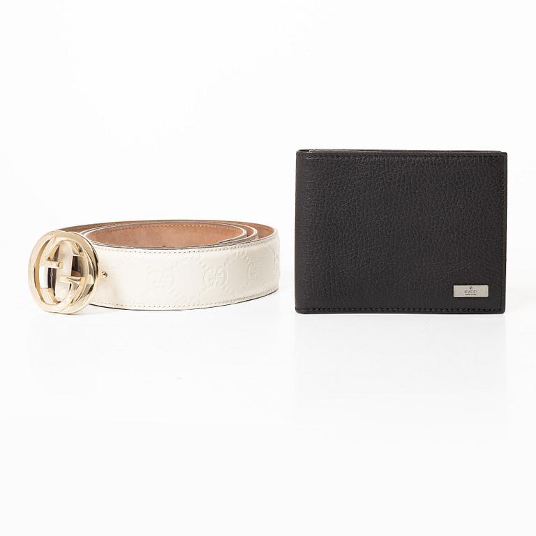Gucci, wallet and belt.