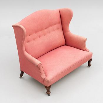 Sofa, circa 1900.