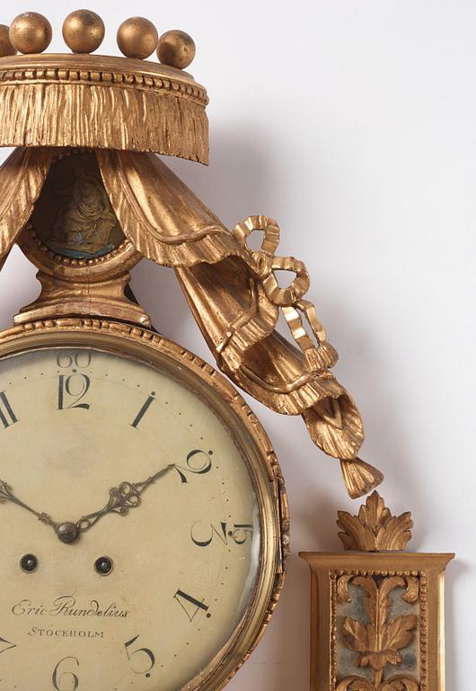 A late Gustavian giltwood cartel clock by E. Rundelius (watchmaker in Stockholm 1793-1815).