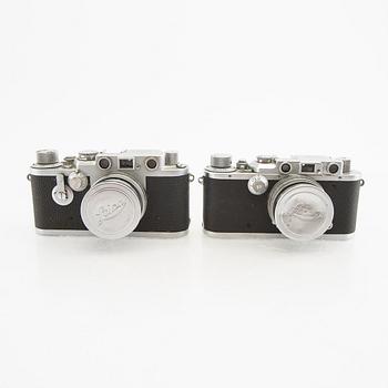 Kameror 2 st samt tillbehör Leica.