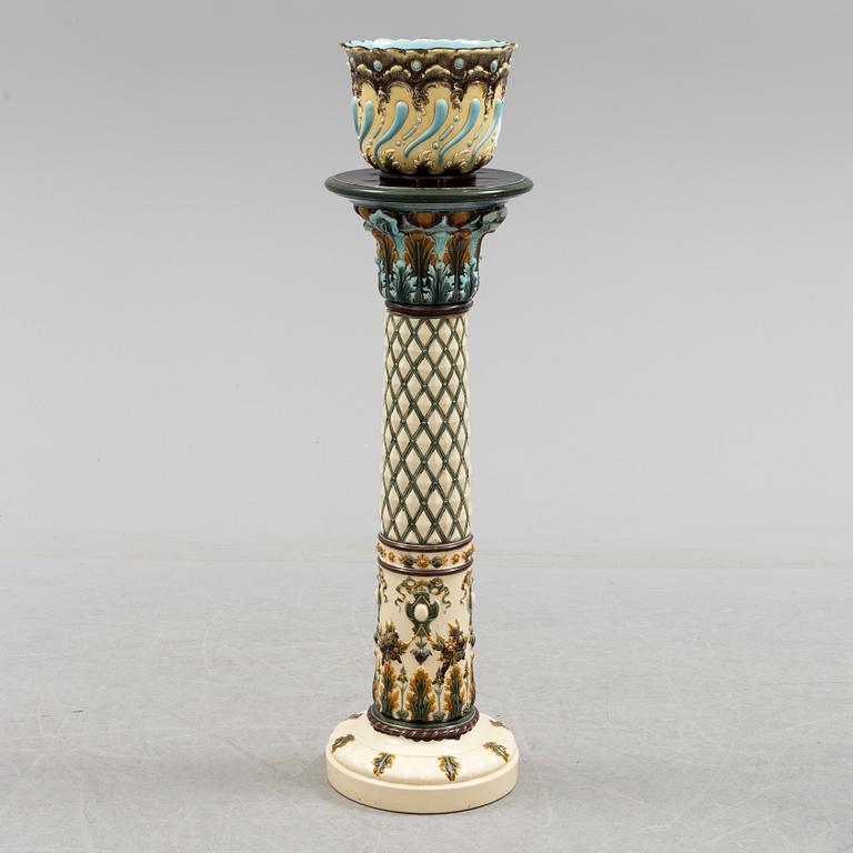 An end of the 19th century maiolica pedestal by Rörstrand.