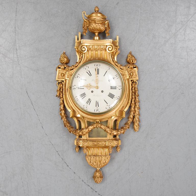 A gustavian style wall clock, signed Rob. Engström, Stockholm. First half of the 20th century.