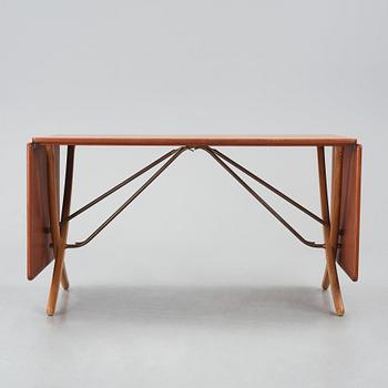 Hans J. Wegner, a teak and oak dining table model "AT-304", Andreas Tuck, Denmark 1950-60s.