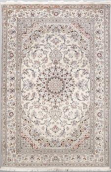 A Nain part silk carpet, 244 x 156 cm.