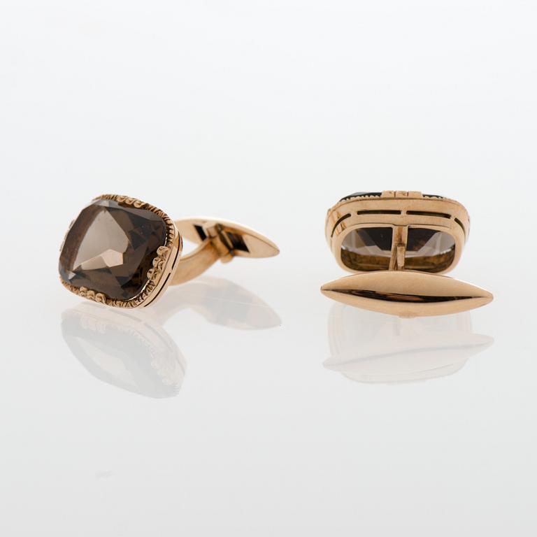 A PAIR OF CUFFLINKS, smoky quartz, 14K gold. Lindroos, Helsinki 1936.