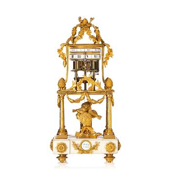 A Louis XVI marble and ormolu 'aux cercles tournants' portico mantel clock, late 18th century.