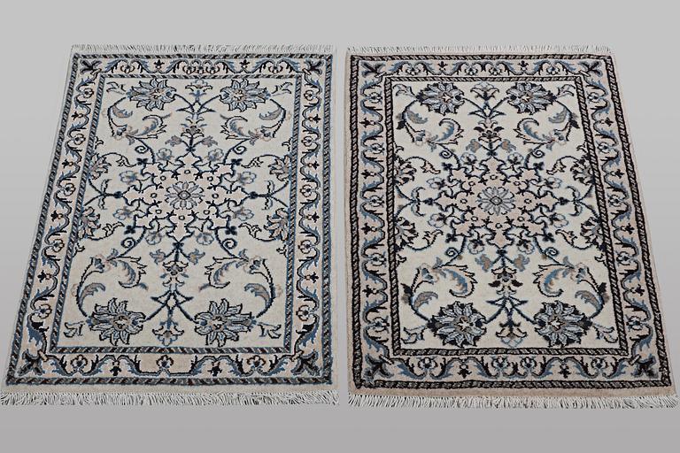 A pair of rugs, Nain, part silk, ca 90 x 60 cm & ca 90 x 60 cm.