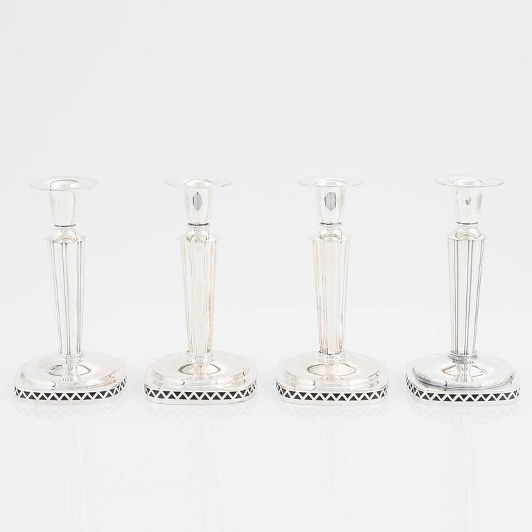 A set of four silver candlesticks by  Tesi, 1955-59.