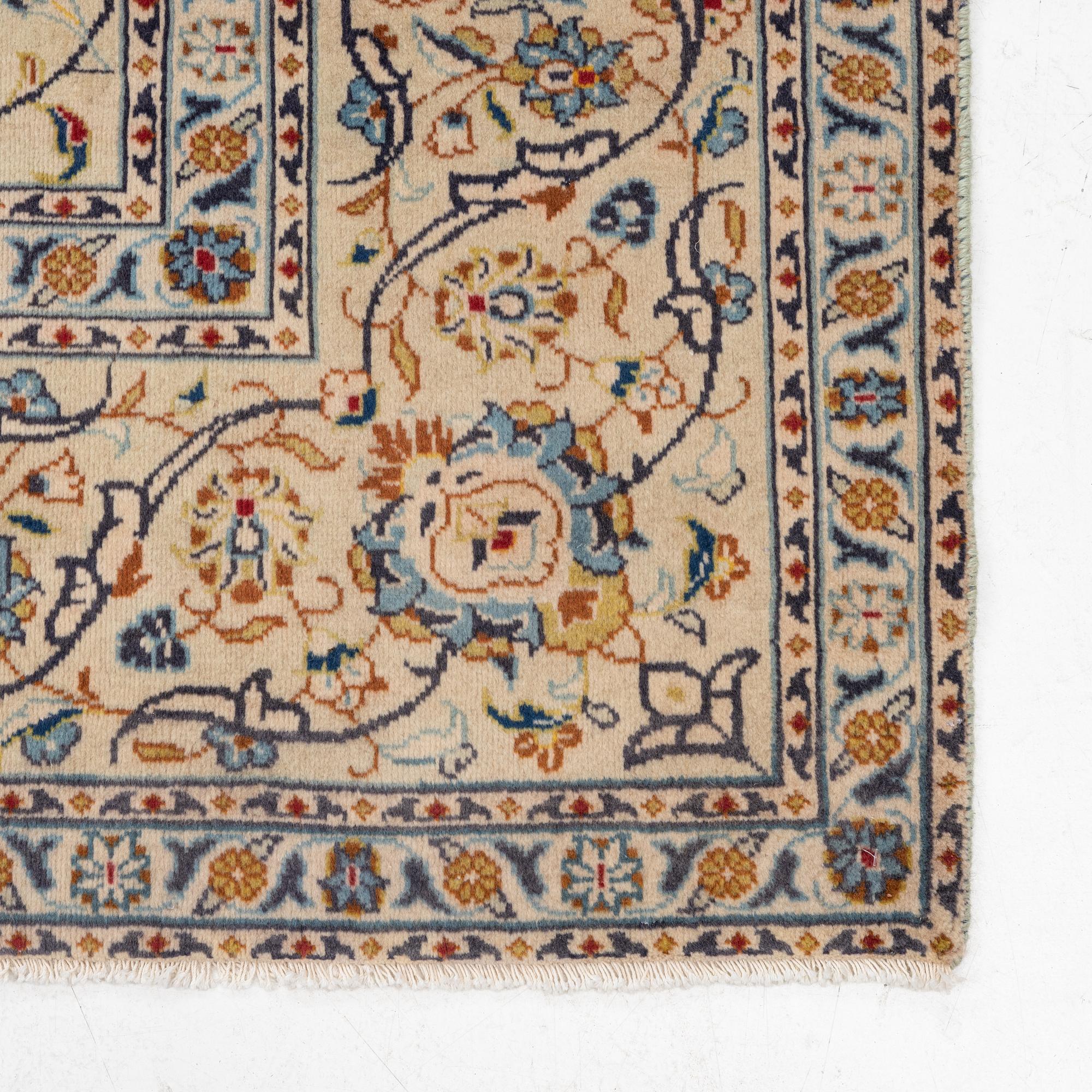 A carpet, Keshan, c. 306 x 214 cm.