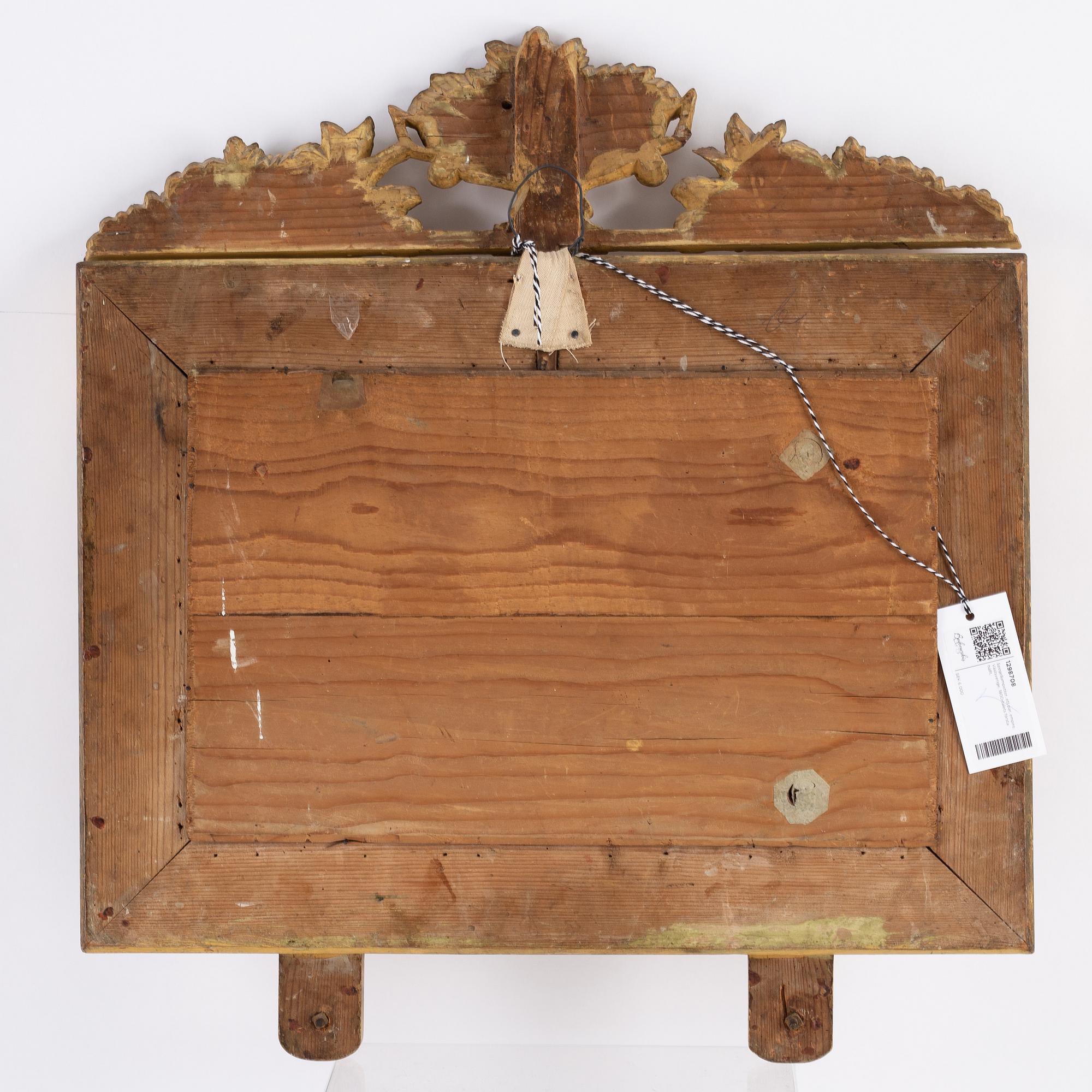 A pair of Swedish Empire mirror wall sconces, first half of the 19th century.