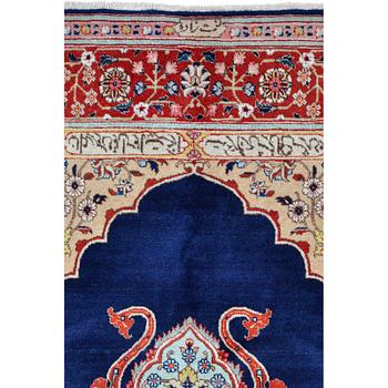 A carpet, Tabriz signed Nematzadeh, ca 291 x 176 cm.
