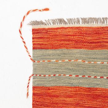 A Kilim rug, c. 245 x 170 cm.