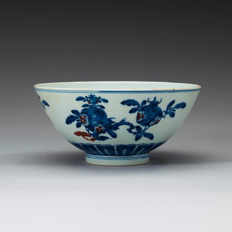 A blue, white and red bowl, late Qing dynasty with Qianlong seal mark.