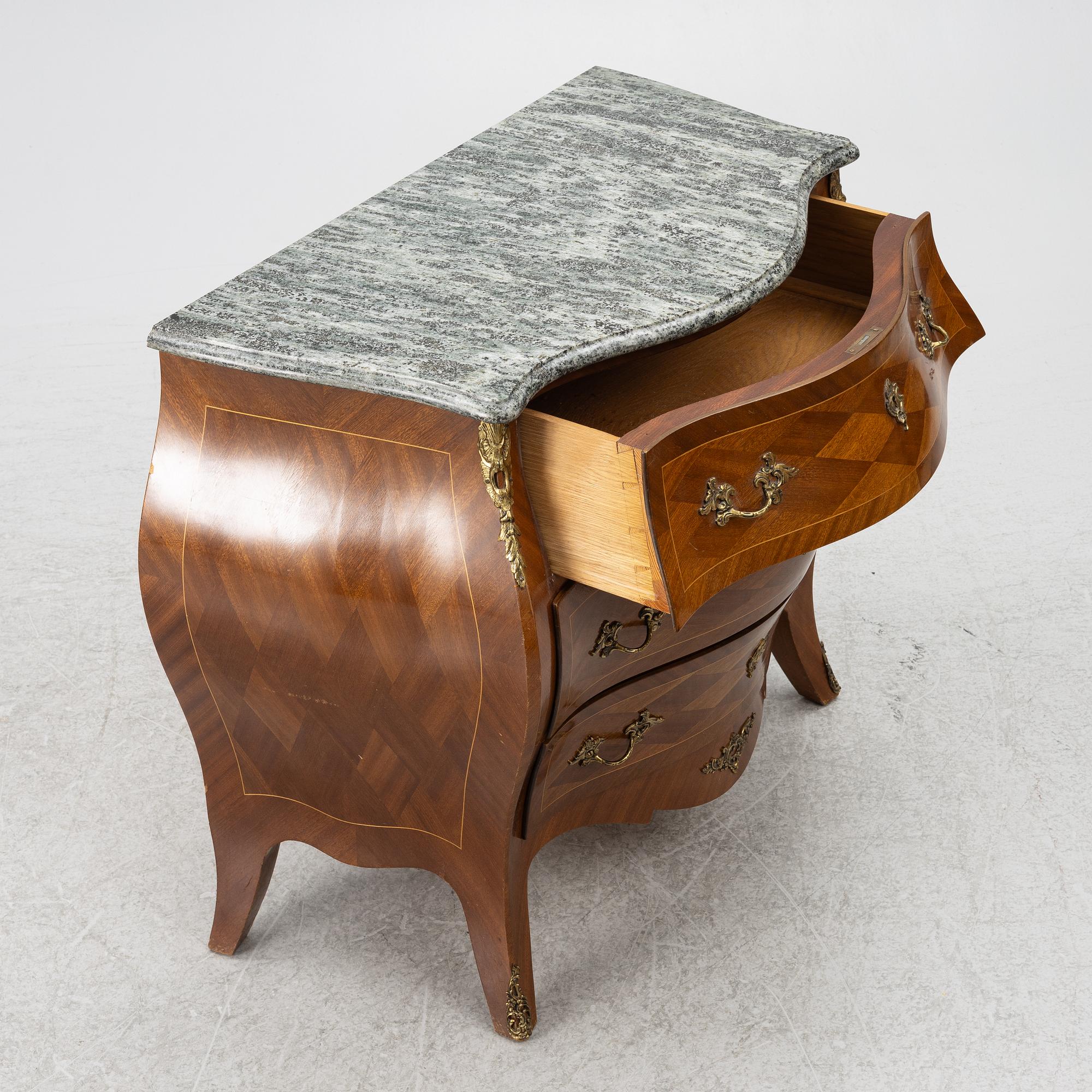 A Rococo style chest of drawers, first half of the 20th Century.