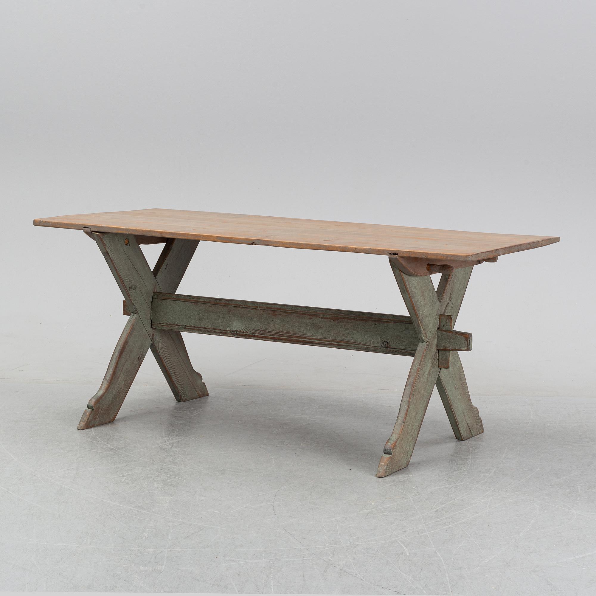 A 19th Century painted pine table.