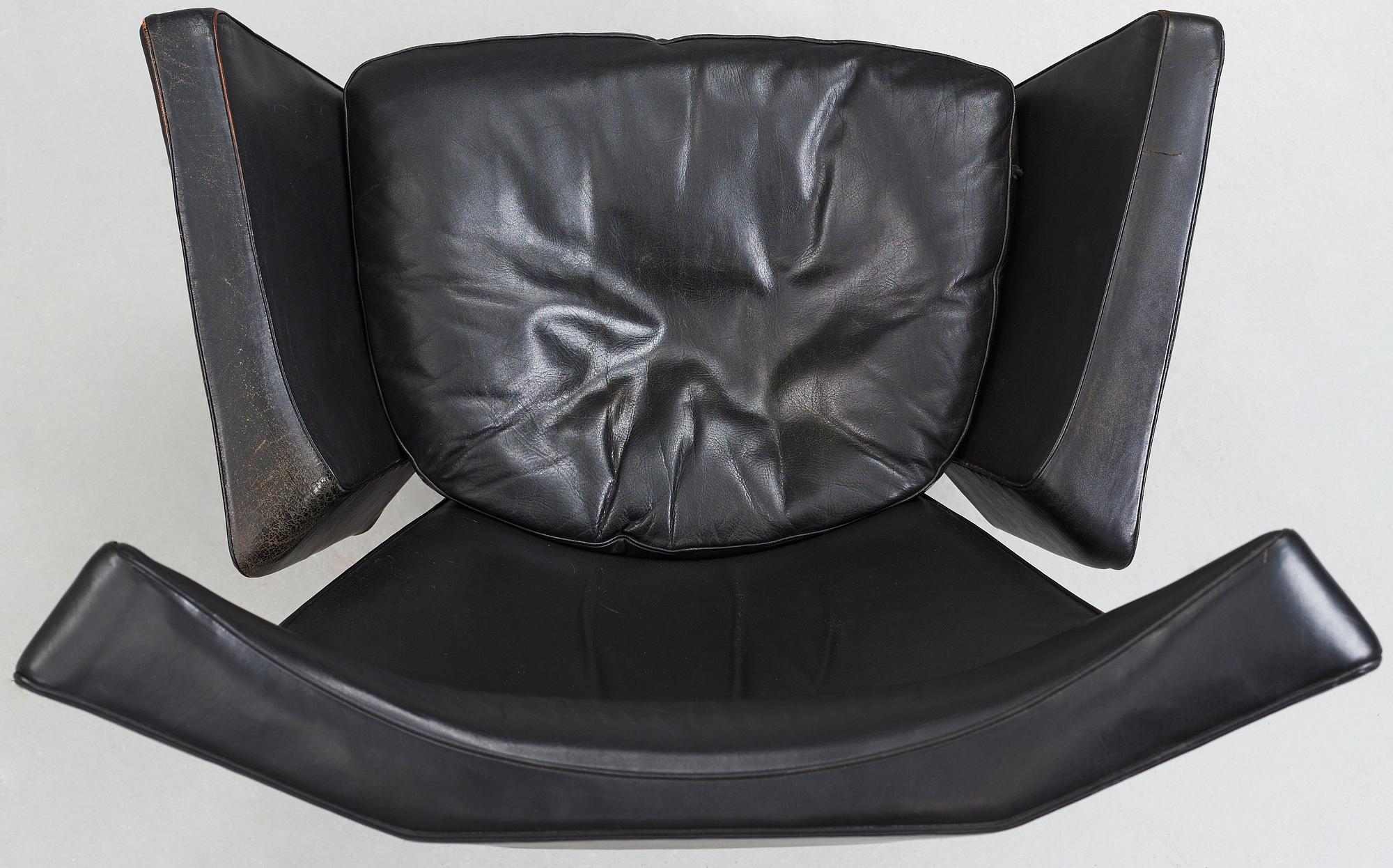 Arne Jacobsen, a black leather and aluminium "Ox-Chair", Denmark 1966.