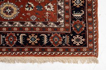 A semi-antique Orientall carpet c. 318 x 202 cm.