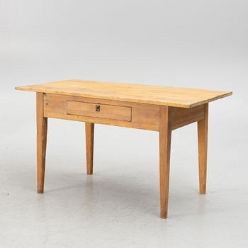 A table with a drawer, 19th century.