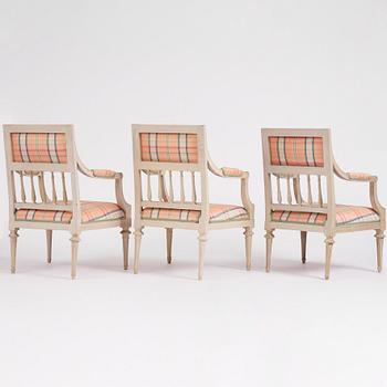 A set of three late Gustavian open armchairs, late 18th century.