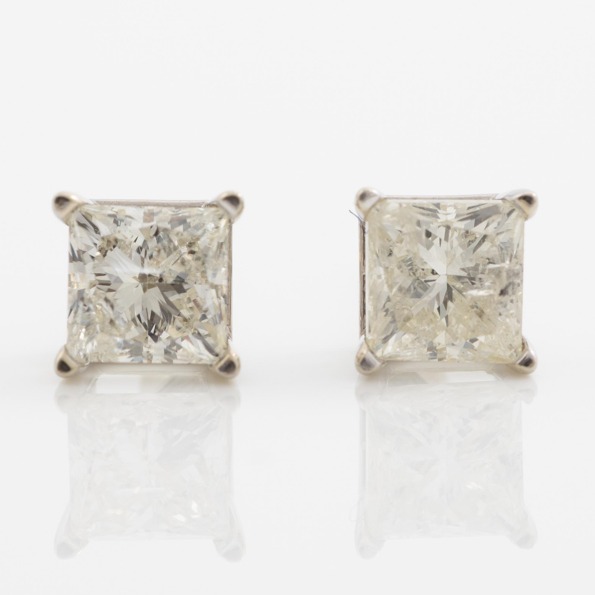 Earrings. a pair, 14K white gold with princess-cut diamonds.